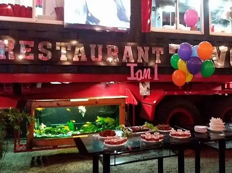 Restaurant Two lit up at night, with the buffet table set in front of the truck